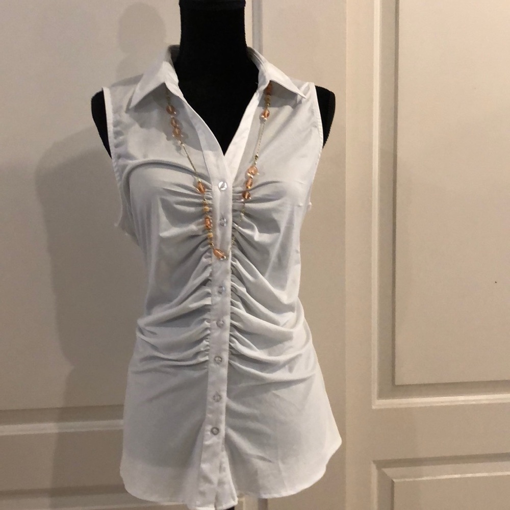 White button up blouse.